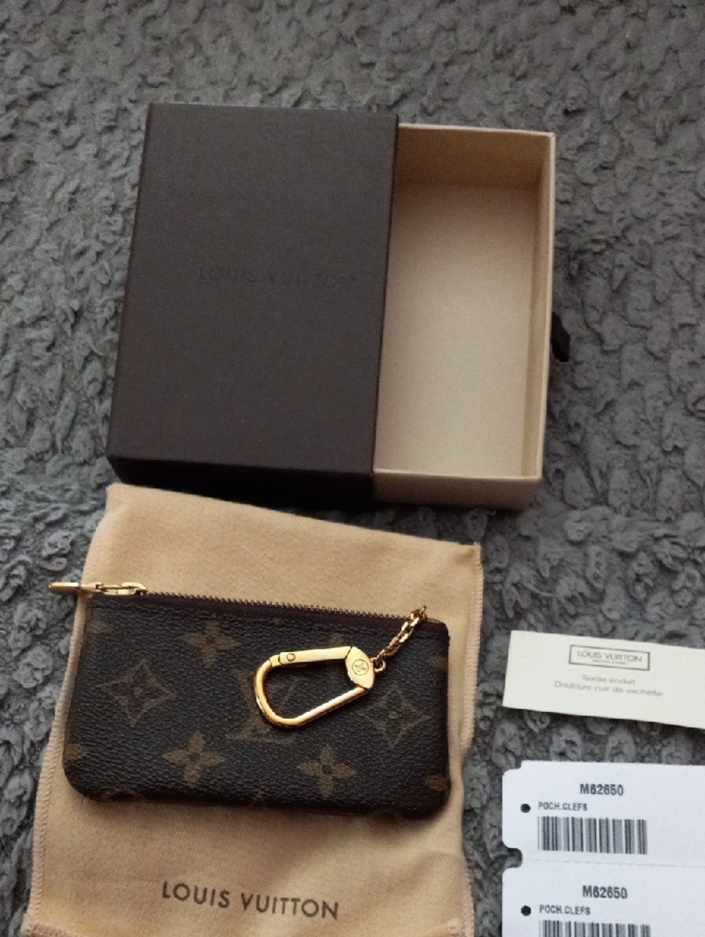 Louis Vuitton Brown Monogram Key Pouch with Gold Hardware - 100% Authentic.